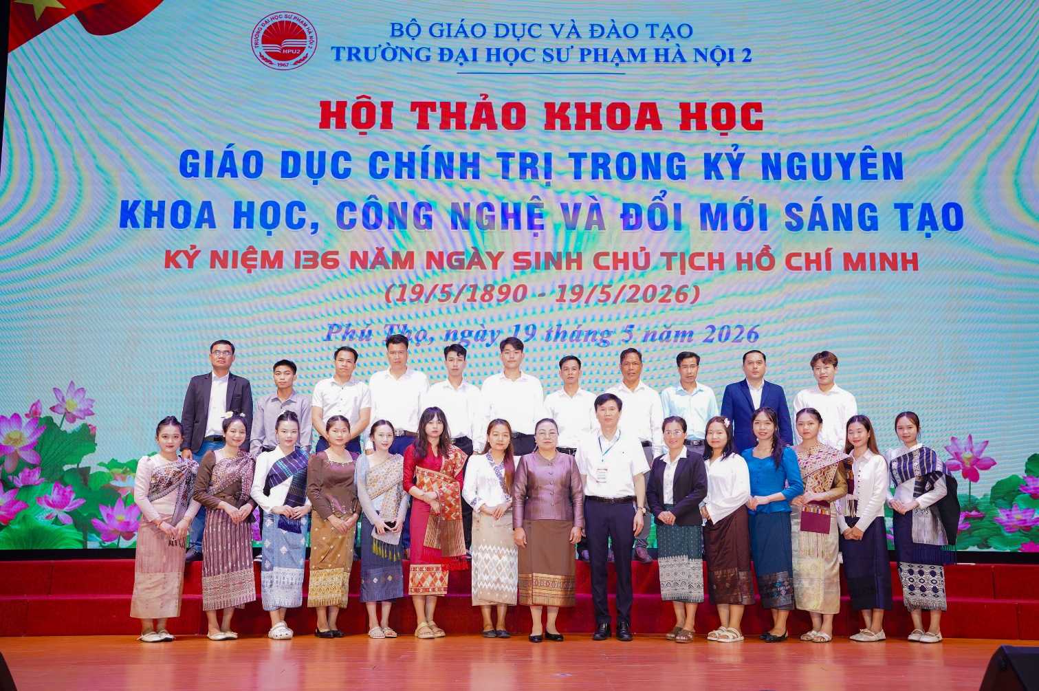 A group of people standing together
Description automatically generated