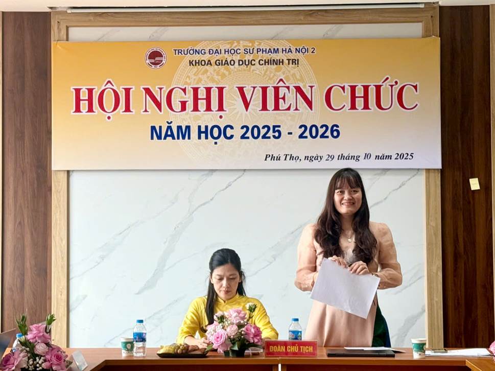 A person standing behind a table with a sign

AI-generated content may be incorrect.