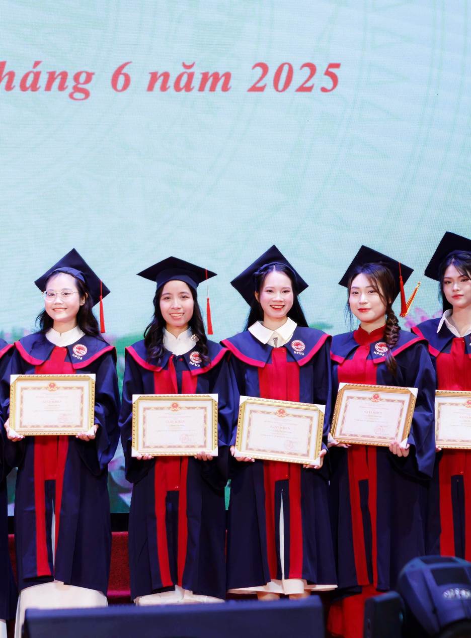 A group of young women in graduation gowns holding certificates

AI-generated content may be incorrect.